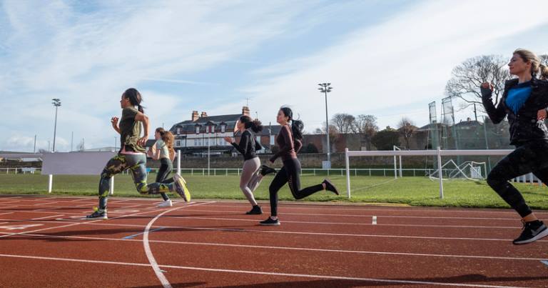 How many laps around a track is a mile