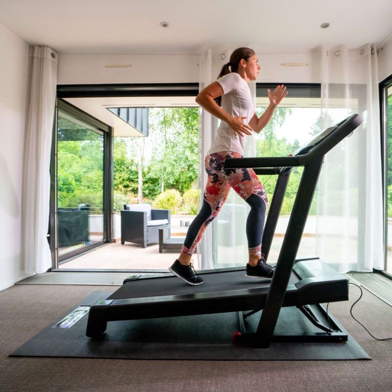 should I put a mat under my treadmill